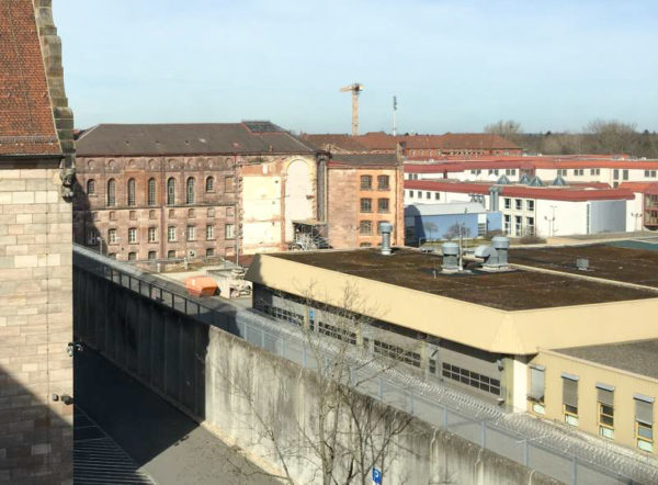 The former prison wing that housed the Nuremberg defendants was destroyed and only white plaster is a reminder of the wing in a preserved part of the central prison building. Photo by anonymous (date unknown). 
