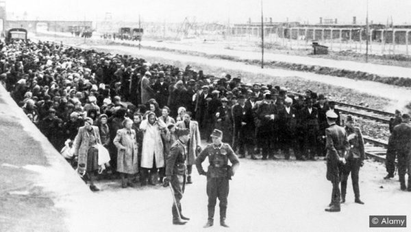 On arrival at Auschwitz, prisoners were sorted either for labor or immediate death. Photo by anonymous (date unknown). Alamy.