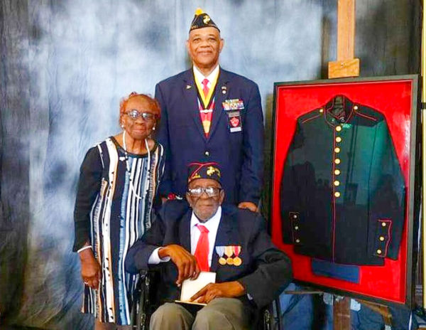 Joseph Alexander (front) awarded the Congressional Gold Medal for being among one of the first African American marines to enlist in the Marine Corps. Photo by anonymous (date unknown). National Montford Point Marine Association. 