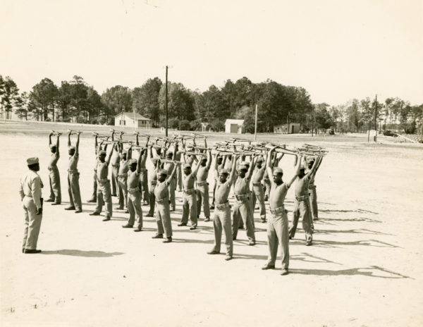 Montford Point Camp. Enlisted men in boot camp. Sgt. Shaw is the drill instructor on the left. Photo by anonymous (c. 1944). Courtesy of the Shaw family.
