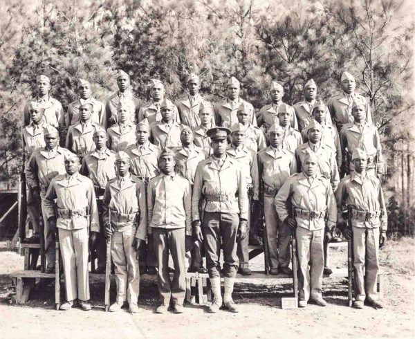 The original Montford Point Marines. I believe Sgt. Edgar R. Huff, drill instructor, is center, front row. Photo by anonymous (date unknown). 