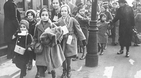 Kindertransport children on their way to board the train that will take them to the Netherlands. Photo by anonymous (c. 1938-39). Youngzine.org.