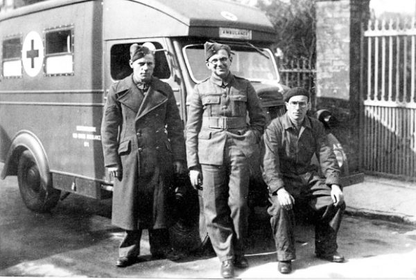 Nicholas Winston (center) as part of the British Red Cross and prior to joining the British Royal Air Force. Photo by anonymous (c. 1940).