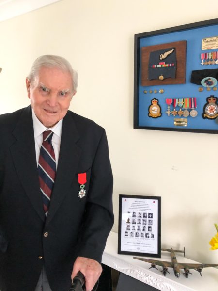 Former Squadron Leader Stanley Booker, MBE wearing the Légion d’honneur medal in recognition of his service to France in liberating the country during World War II. Photo by Pat Vinycomb (January 2021). Courtesy of Pat Vinycomb.