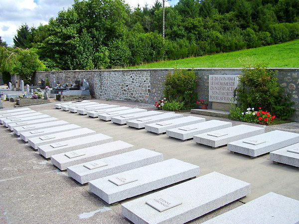 Tombs of the twenty-seven victims of the 26 June 1944 massacre at Dun-les-Places. Photo by LecomteB (August 2010). PD-GNU Free Documentation License. Wikimedia Commons. 