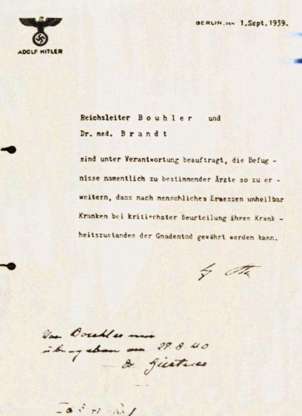 Official directive on Hitler’s personal stationary (and signed by the Führer) directing Bouhler and Brandt to establish the euthanasia program known as “Aktion T4.” Photo by Marcel (March 2008). PD-Official Decree (German). Wikimedia Commons.