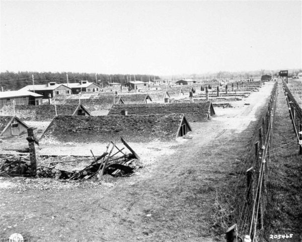 KZ Dachau subcamp Kaufering IV shortly after liberation. Photo by anonymous (29 April 1945). United States Holocaust Memorial Museum. PD-U.S. Government. Wikimedia Commons.