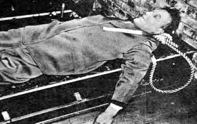 The body of Arthur Seyss-Inquart after his execution. The International Military Tribunal in Nuremberg found Seyss-Inquart guilty on three of the four counts of indictment: Planning and waging wars of aggression, war crimes, and crimes against humanity. Photo by U.S. Army (16 October 1946). PD-U.S. Government. Wikimedia Commons.