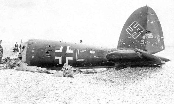 The rear fuselage of a Heinkel He 111H. The bomber was shot down by pilots of the No. 145 Squadron. Photo by anonymous (July 1940). Imperial War Museum. PD-Expired copyright. Wikimedia Commons. 
