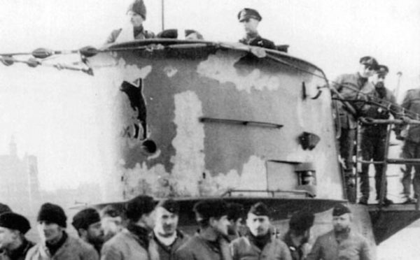 Crewmen line the superstructure of the German submarine U-48, which sank the passenger ship SS City of Benares while the vessel was en route to Canada. Photo by anonymous (c. 1940).