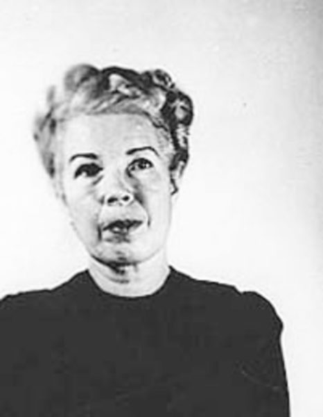 Mugshot of Mildred Gillars (née Sisk), a.k.a. “Axis Sally.” Photo by anonymous (date unknown). PD-U.S. Government. Wikimedia Commons.
