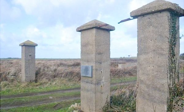 Entrance posts to former “Lager Sylt,” or Camp Sylt. A memorial plaque is mounted on one of the original posts. It is currently the only memorial on the site. Photo by anonymous (date unknown). 
