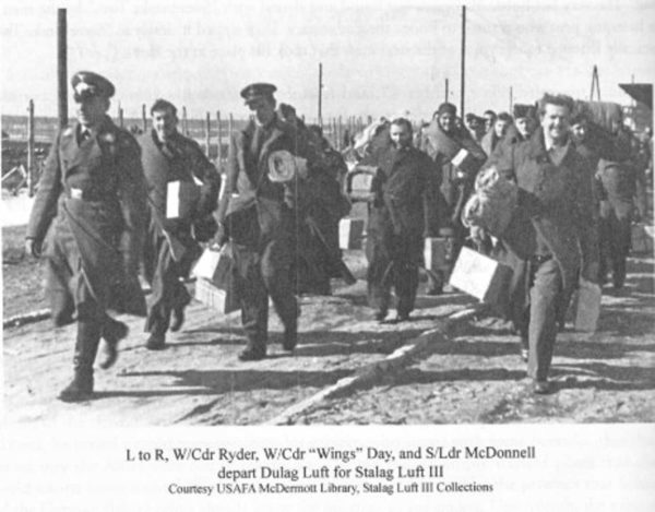 Downed Allied airmen leaving Dulag Luft (later, Camp King) for their permanent POW camp, Stalag Luft III. Photo by anonymous (date unknown). 