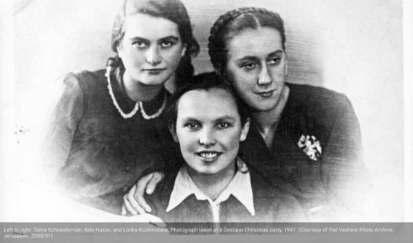 Left to right: Tema Schneiderman (1917−1943), Bela Hazan (1922−2004), and Lonka Kozibrodska (1916−1943). This photo was taken at a Gestapo Christmas party. The three were Freedom couriers. Hazan worked as a translator for the Nazis and had access to information that she passed onto the Jewish resistance. Schneiderman was executed by the Nazis and Kozibrodska died in Auschwitz. Photo by anonymous (c. 1941). Courtesy of Yad Vashem Photo Archive, Jerusalem. 3308/91.