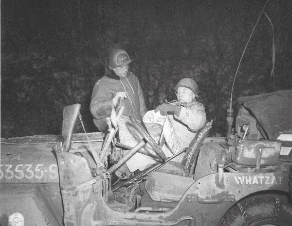 MG Rose (left, standing) with his second-in-command, BG Doyle Hickey (right, sitting in jeep). Hickey replaced Rose as commander of the 3rd in March 1945 after Rose was killed. Photo by anonymous (date unknown). Courtesy of Ben Savelkoul. www.bensavelkoul.nl 