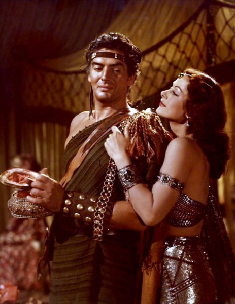 Victor Mature and Hedy Lamarr as “Samson and Delilah” (1949). Photo by anonymous (c. 1949). PD-Expired copyright. Wikimedia Commons. 