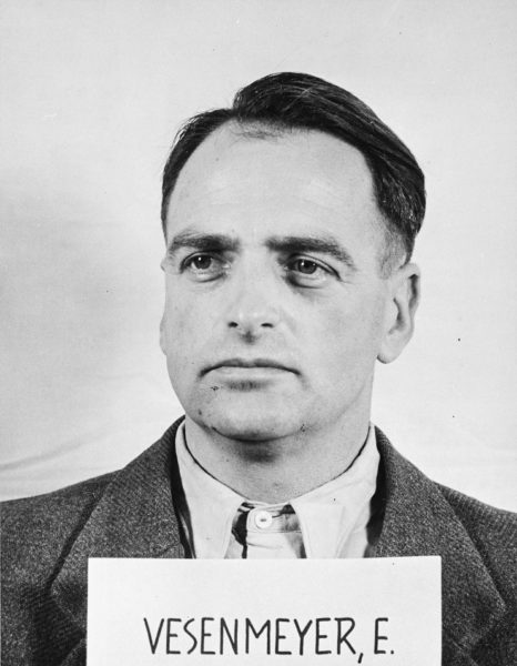 Mug shot of Edmund Veesenmeyer, a defendant in the Nuremberg Ministries Trial (Case 11). Veesenmayer was one of senior Nazi enablers for the Holocaust. John McCloy pardoned him and Veesenmeyer only served two years. Photo by anonymous (c. 1947-49). U.S. Holocaust Memorial Museum, courtesy of Robert Kempner. PD-U.S. Government. Wikimedia Commons.