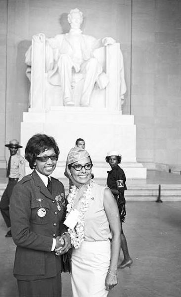 Josephine Baker (left) appears with Lena Horne (right) during the March on Washington in 1963. They are standing in front of the Lincoln Memorial. Photo by anonymous (August 1963). 