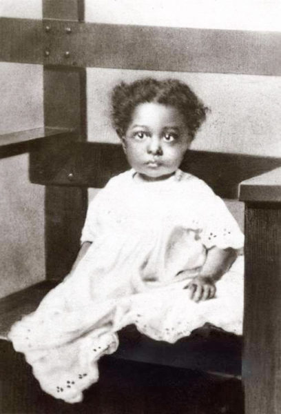 Josephine Baker (née McDonald) as an infant. Photo by anonymous (c. early 1900s). PD-Published before 1926. Wikimedia Commons.