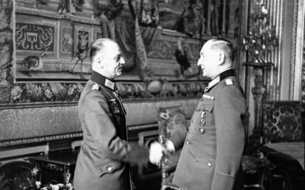 Rundstedt (left) greeting Generalfeldmarshall Erwin von Witzleben (right). This meeting took place at Vaux-le-Vicomte, located near Melun, fifty-five kilometers (34 miles) south-east of Paris. Photo by Dieck-Scherl Bilderdienst (c. April 1941). Bundesarchiv, Bild 101I-246-073-23/Dieck/CC-BY-SA 3.0. PD-CCA-Share Alike 3.0 Germany. Wikimedia Commons.