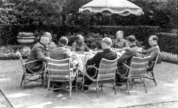 Rundstedt and his officers enjoying their afternoon tea in the rear courtyard of the Villa David. The patio still exists but is in disrepair. Photo by anonymous (c. between March 1942 and July 1944). BA 719/0245/9. “After the Battle”, Number 141, page 7. http://afterthebattle.com.au.