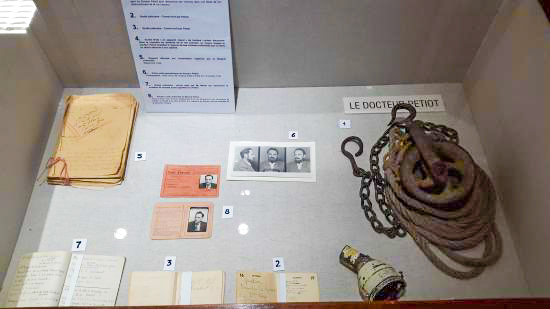 Paris police museum exhibit on the French serial killer, Dr. Marcel Petiot. Photo by anonymous (date unknown).