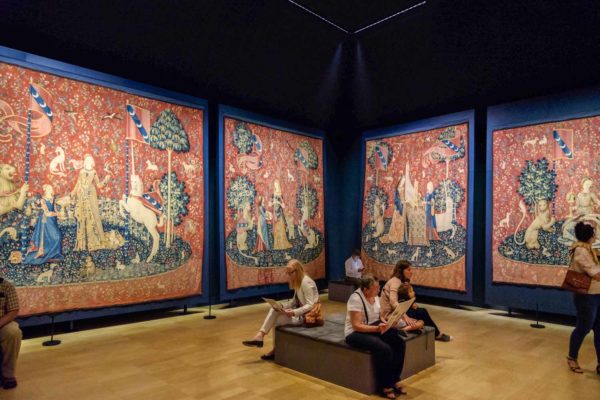 The Lady and the Unicorn tapestries on display at the Musée de Cluny. Photo by Joe DeSousa (c. 2015). PD-CC0 1.0 Universal Public Domain Dedication. Wikimedia Commons.