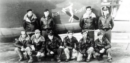 Crew members of “Hot Stuff.” Standing from left to right: Lt. Robert Jacobson (bombardier), Capt. Robert Shannon* (pilot), Lt. James Gott* (navigator), and Lt. John Lenz (co-pilot). Front row, left to right: S/Sgt Grant Rondeau (top turret gunner), Joseph Craighead (engineer/gunner), L.F. Durham (tail gunner), S/Sgt Paul McQueen* (waist gunner), T/Sgt Kenneth Jeffers* (radio operator), and George Farley (waist gunner). S/Sgt George Eisel temporarily replaced Durham. M/Sgt Lloyd Weir* temporarily replaced Craighead on the fateful flight. Photograph taken at RAF Alconbury, England. * - Died in crash. Photo by anonymous (c. September 1942). Courtesy of Warbirdfan. PD-CCA-Share Alike 3.0 Unported. Wikimedia Commons.