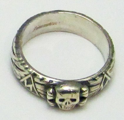 Skull head ring awarded to SS men by Himmler. Photo by Helfmann (August 2010). PD-CCA-Share Alike 3.0 Unported. Wikimedia Commons.