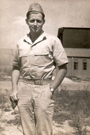 Last known photograph of Joseph P. Kennedy, Jr. taken before he took off for Operation Aphrodite. Photo by Earl P. Olsen (12 August 1944). PD-Author release. Wikimedia Commons.