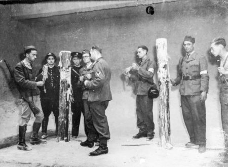 Nazi death chamber in the cellar of the former Ministry of Aviation building. Two members of the FFI hold steps of cloth used as blindfolds. Formerly a firing range, it was converted into a fireproof and soundproof structure where prisoners were tortured, burned alive, or shot before a firing squad. Photo by anonymous (c. 1944). Author's collection.