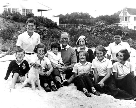 The Kennedy family at Hyannis Port. Photo by Richard Sears (4 September 1931). John F. Kennedy Presidential Library and Museum. PD-U.S. Government. Wikimedia Commons.