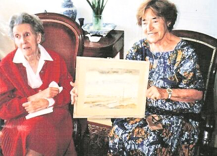 Mary Elmes (left) and Friedel Bohny-Reiter (right) of the Swiss Red Cross. This photo was taken a few months before Mary’s death at the age of ninety-four. Friedel is presenting Mary with a painting of the Rivesaltes camp. Photo by anonymous (c. 2002). Courtesy of AFSC.