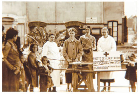 Mary Elmes in Almeria (standing second from left next to Red Cross sign). Photo by anonymous (date unknown). 