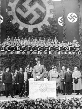 Adolf Hitler laying the foundation stone of the KDF-Wagen (Volkswagen) factory at Fallersleben (Wolfsburg). Ferdinand Porsche is standing at the far right. Photo by anonymous (26 May 1938).