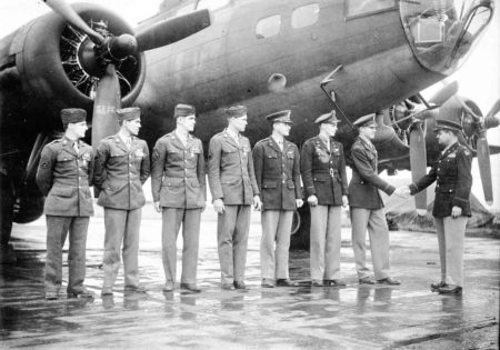 Col. Curtis LeMay congratulating a bomber crew. Photo by anonymous (c. 1943). PD-U.S. Government. Wikimedia Commons. 