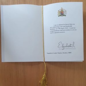 Signed interior of birthday card from Queen Elizabeth II to Stanley Booker, MBE. Photo by Pat Vinycomb (29 April 2022).