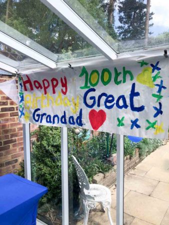 Birthday banner made by the grandchildren and great grandchildren. Photo by Pat Vinycomb (24 April 2022).