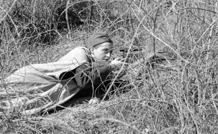 Sniper Lyudmila Pavlochenko in combat at Sevastopol. Photo by anonymous (c. June 1942). Ozerksy/AFP/Getty Images.