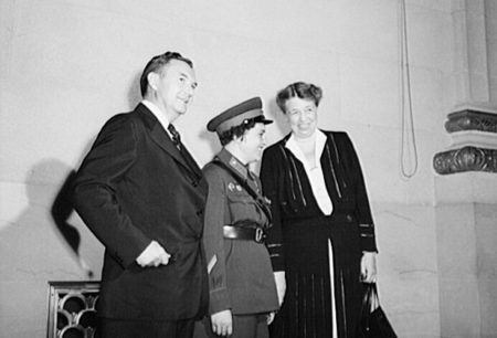 Lyudmila Pavlichenko (center) in Washington D.C. as a Soviet representative/delegate of the International Youth Assembly. Flanked by Justice Robert Jackson (left) and Eleanor Roosevelt (right), Pavlichenko was used by Stalin as part of his propaganda campaign. Photo by Jack Delano (September 1942). Library of Congress. PD-U.S. Government. Wikimedia Commons. 