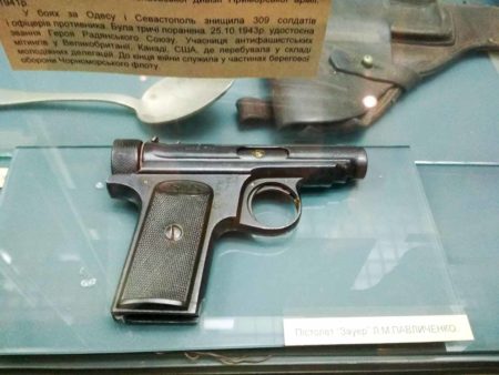 Lyudmila Pavlichenko’s J.P. Sauer 1913 pistol. One bullet was always saved. Photo by VoidWanderer (16 July 2018). World War II Museum in Kyiv. PD-CCA-Share Alike 4.0 International. Wikimedia Commons.