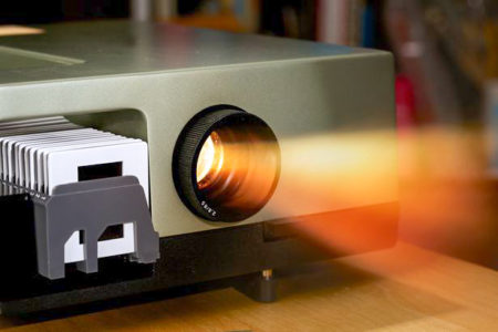 An ancient slide projector. Photo by anonymous (date unknown). RG-VC/iStockphoto. 