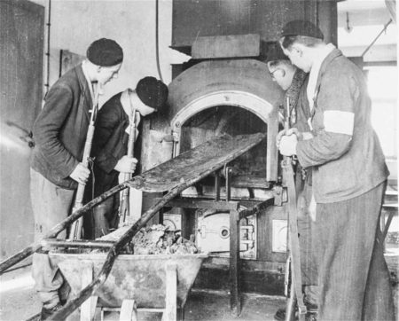 French resistance members inspect the Natzweiler-Struthof crematorium. Photo by anonymous (c. December 1944). PD-U.S. Government. Wikimedia Commons.