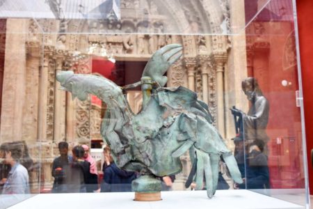 The battered copper rooster that used to sit atop the Spire of Notre-Dame Cathedral. Photo by Sandy Ross (8 June 2022).