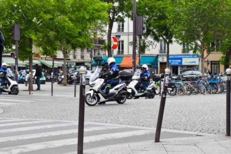 The French motorcycle police arrive to barricade the street. Photo by Sandy Ross (5 June 2022).