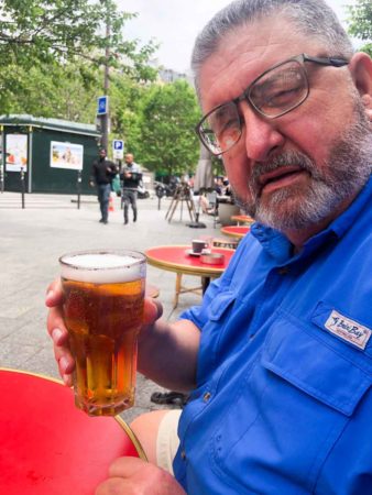 Stew sitting and enjoying his second beer after the protestors have moved on. Photo by Sandy Ross (5 June 2022). 