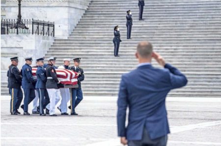 Hershel “Woody” Williams’ casket is carried by service members from the U.S. Capitol after lying in honor on Thursday, 14 June in Washington. Photo by Haiyn Jiang (14 June 2022). New York Times via AP Pool. 