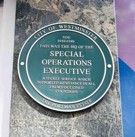 The blue plaque memorializing 64 Baker Street as the former headquarters of the Special Operations Executive, a secret service which supported resistance in all enemy-occupied countries during World War II. Photo by Sandy Ross (14 June 2022).