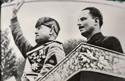 Benito Mussolini (left) and Sir Oswald Mosley (right). Photo by anonymous (c. 1936). PD-Copyright expired. Wikimedia Commons. 
