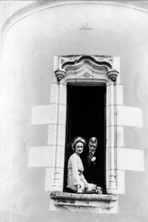 The newly married couple framed by a window at the Château de Candé. Photo by anonymous (c. June 1937).